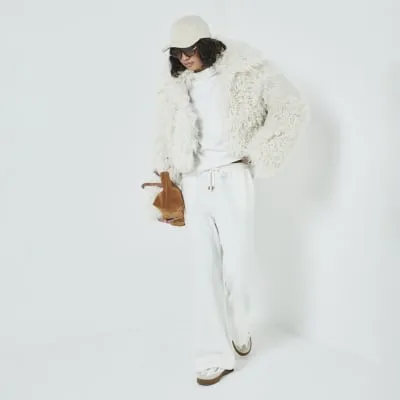 Cream Wide Leg Trousers sold by River Island