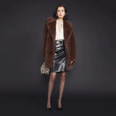Brown faux fur coat sold by River Island