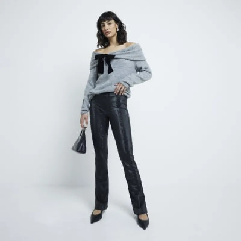 Black High Waisted Snake Flared Trousers sold by River Island
