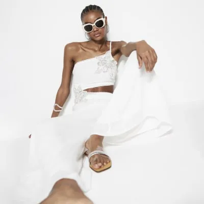 Cream Sequin One Shoulder Jumpsuit sold by River Island