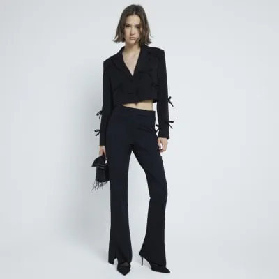 Black Slim Tailored Flare Trousers sold by River Island