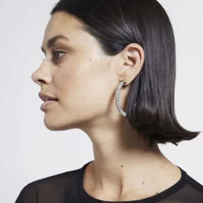 Gold diamante stone hoop earrings sold by River Island