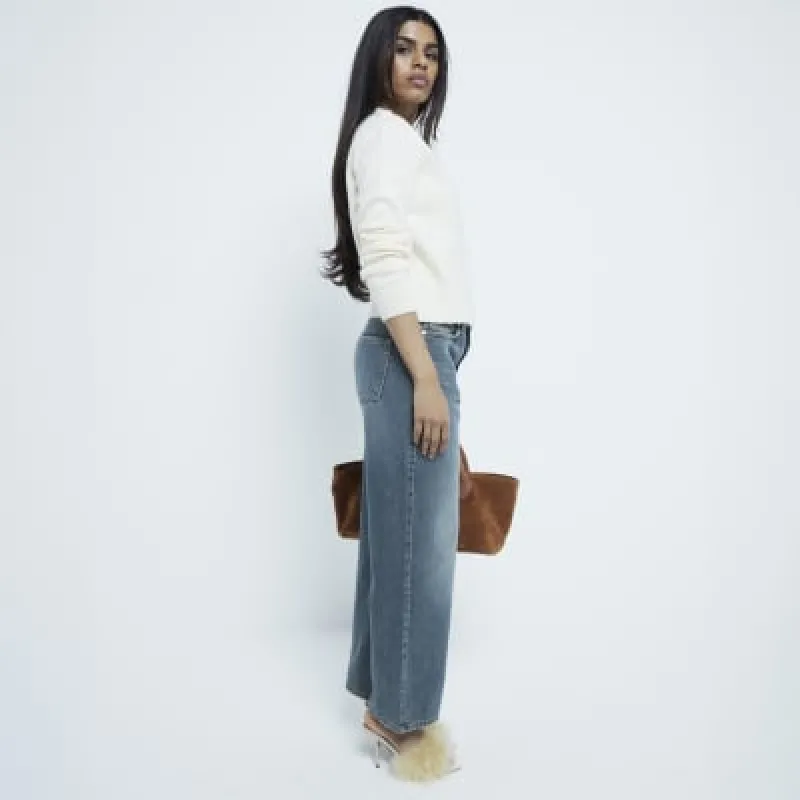 Petite Blue Denim Relaxed Straight Jeans sold by River Island