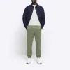 Green slim fit pull on joggers sold by River Island