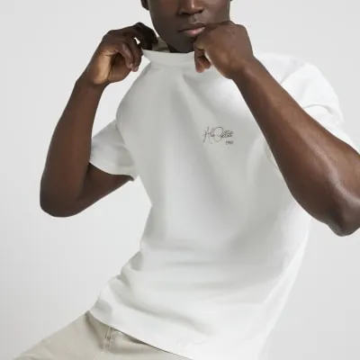 Beige regular fit graphic script t-shirt sold by River Island