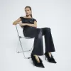Black Feather Sling Back Court Shoes sold by River Island