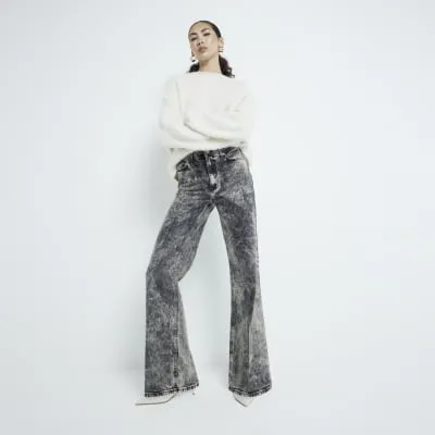 Black Acid Wash Denim Wide Leg Jeans sold by River Island