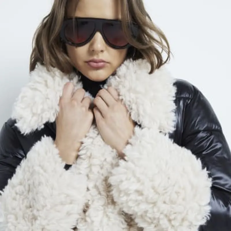 Black Borg Vinyl Puffer Jacket made by River Island