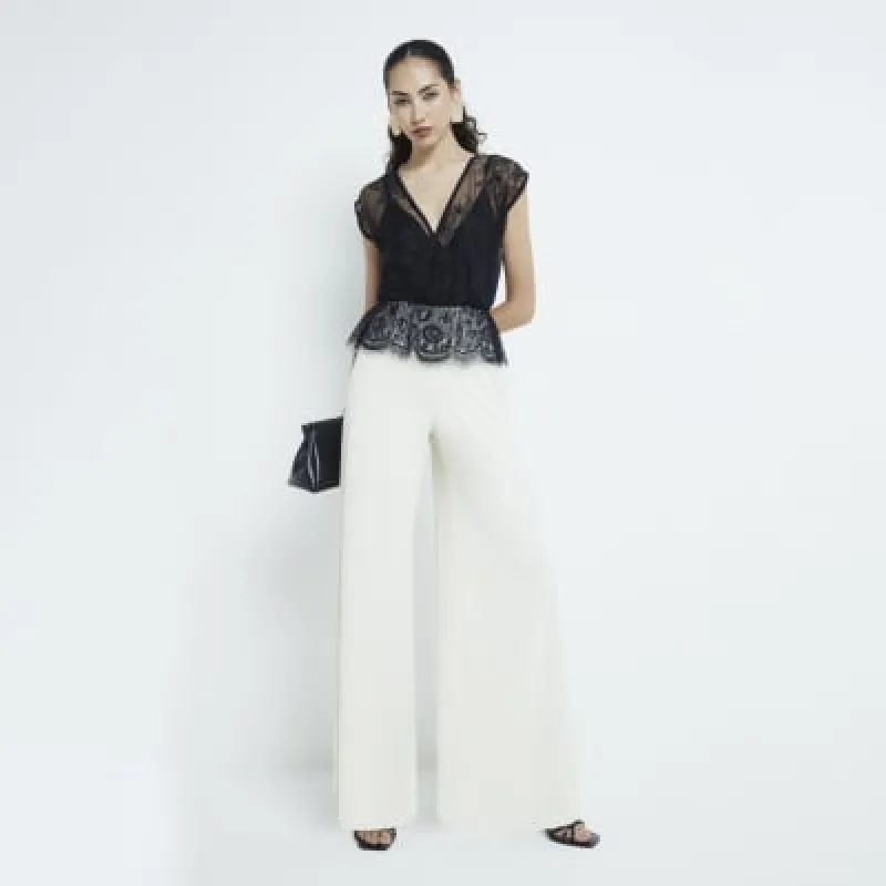 Cream Lace Jumpsuit sold by River Island