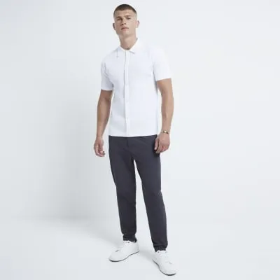 White muscle fit brick knit shirt sold by River Island