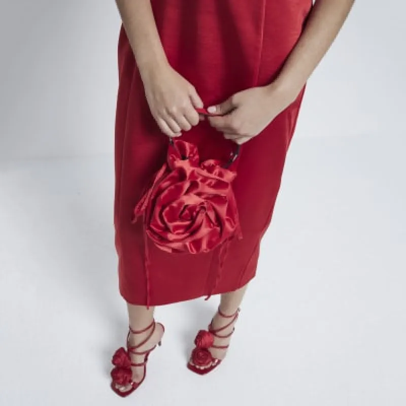 Red Satin Flower Corsage Clutch Bag sold by River Island