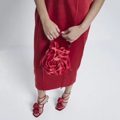 Red Satin Flower Corsage Clutch Bag sold by River Island