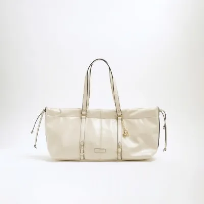 Cream Scrunch Duffle Bag sold by River Island