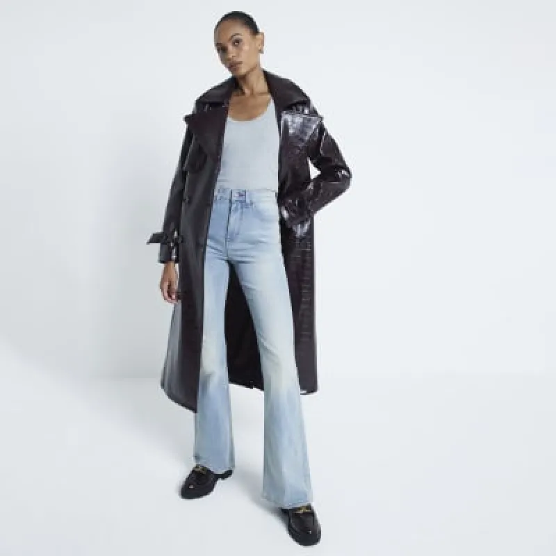 Blue high rise tummy holding flared jeans made by River Island