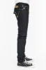 MENS RAW DENIM SLIM FIT KILLER FLAP JEANS WITH O.E. SCRIPT AND CRYSTALS sold by Robin's Jean