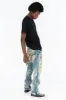 VINTAGE RIPPED,DISTRESSED & REPAIRED JEANS WITH BACK POCKET CRYSTALS IN OMAHA WASH sold by Robin's Jean
