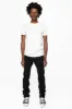 MENS LONG FLAP SLIM JEANS WITH FULL CRYSTALS & STUDS IN PURE BLK WASH sold by Robin's Jean