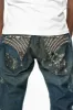 KILLER FLAP STRAIGHT LEG JEANS WITH CRYSTALS AND PYRAMID IN JUPITER BLUE SPECIALTY WASH sold by Robin's Jean