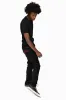 LONG FLAP SLIM FIT MENS JEANS WITH RED CRYSTALS IN OVER-DYE BLACK sold by Robin's Jean