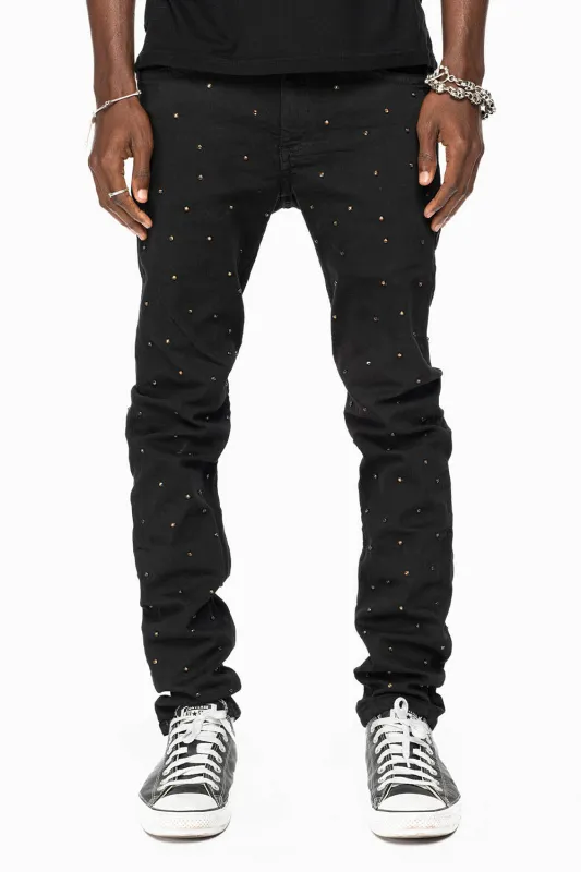 SKINNY JEAN IN PURE BLACK WITH GOLD O.E. LOGO EMBELLISHED ALLOVER WITH SMOKY TOPAZ CRYSTALS sold by Robin's Jean