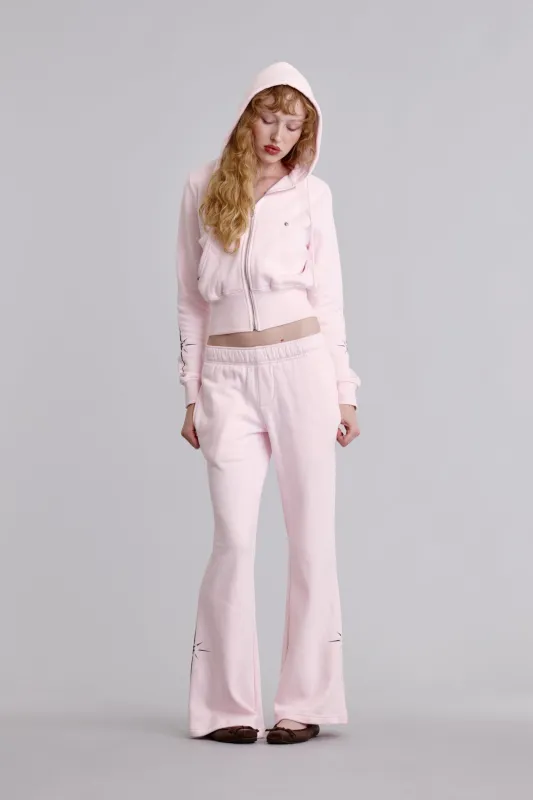Starburst Flare Sweatpants in Pink sold by Rock Revival