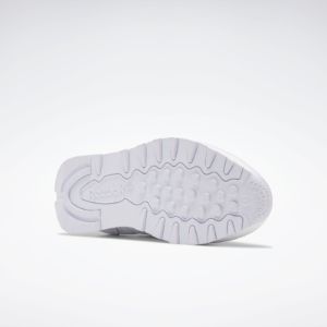 Reebok Footwear Men Classic Leather Shoes Ftwwht/Ftwwht/Pugry3 sold by Rockport