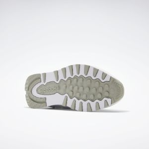 Reebok Footwear Men Classic Leather Shoes Ftwwht/Pugry3/Purgry sold by Rockport