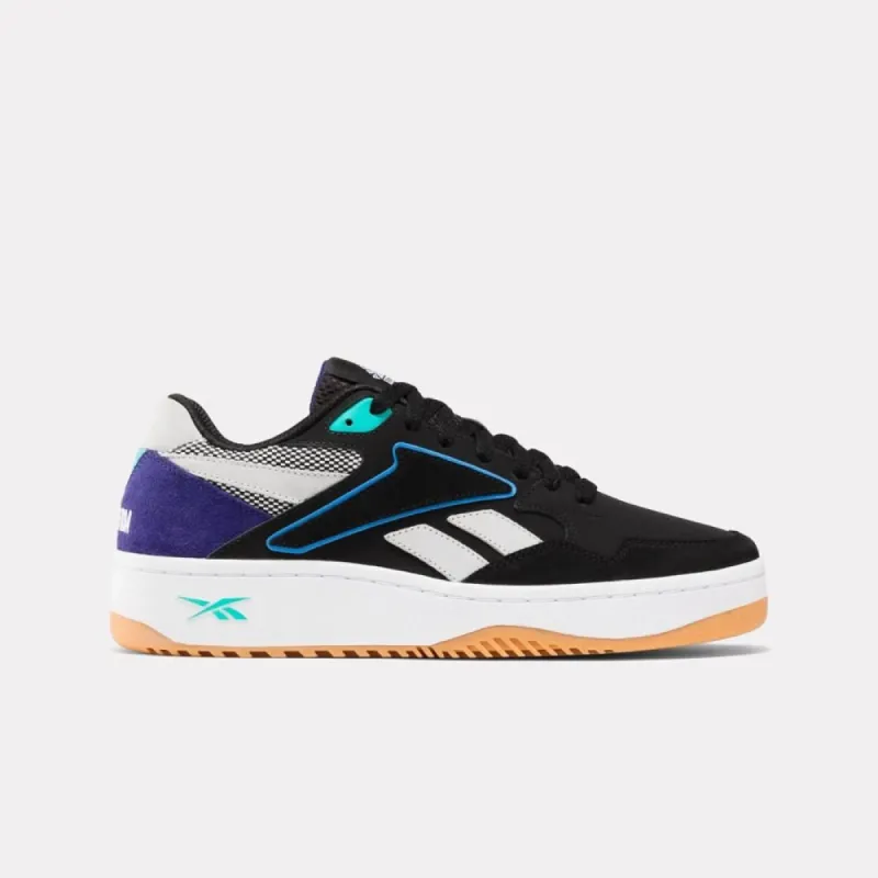 Reebok Footwear Men 100200469 CBLACK/BOLPRP/FTWWHT sold by Rockport