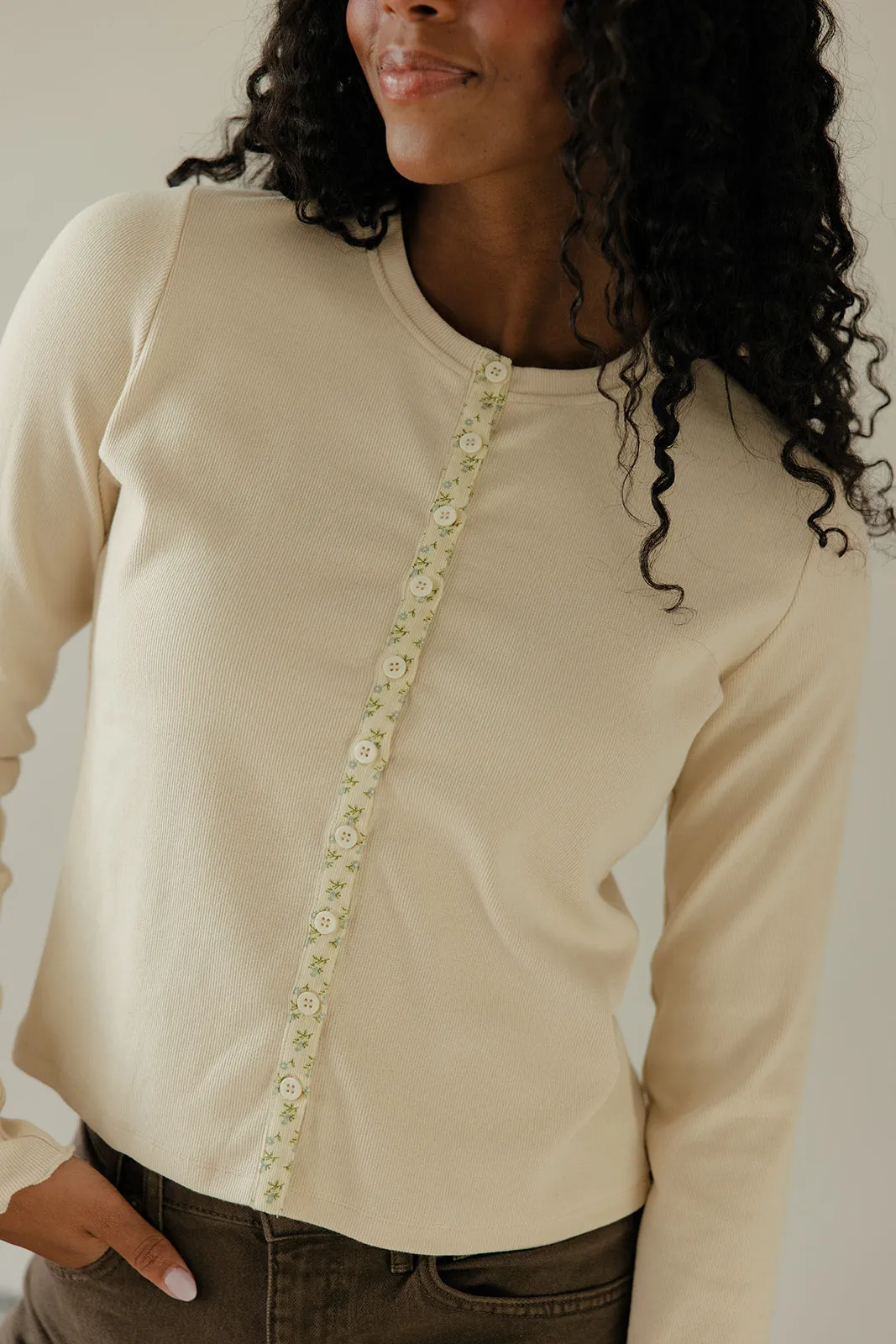 Refined Edge Button Top sold by Roolee