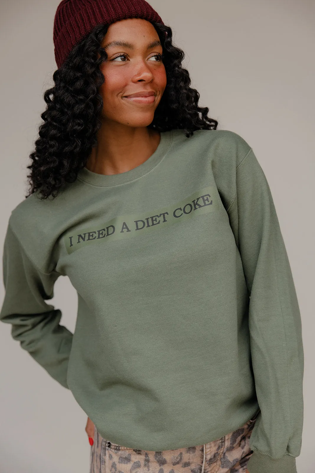 I Need A Diet Coke Sweatshirt sold by Roolee