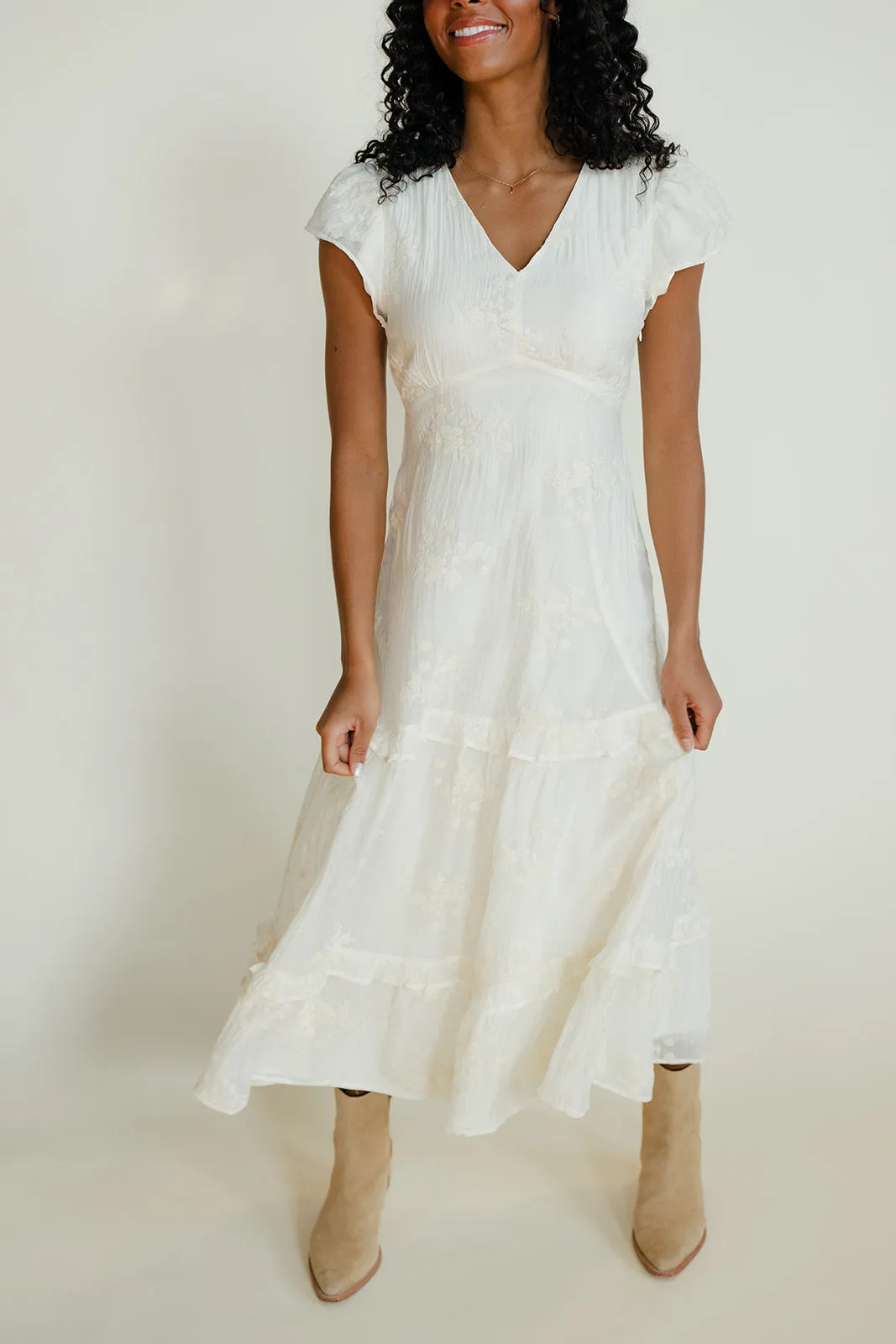 The Serenade Ruffle Dress sold by Roolee