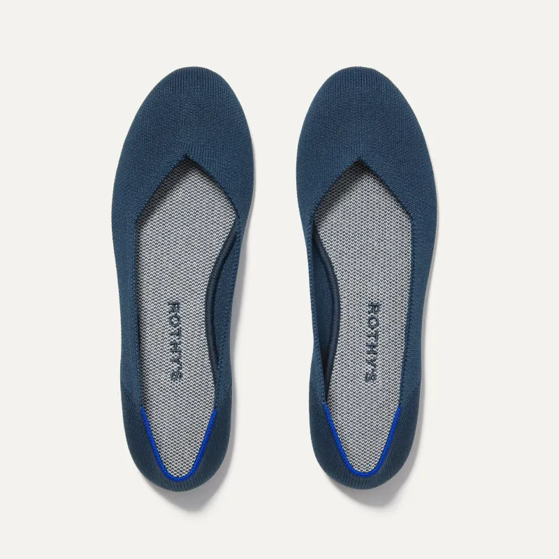 The Flat - Navy sold by Rothy's