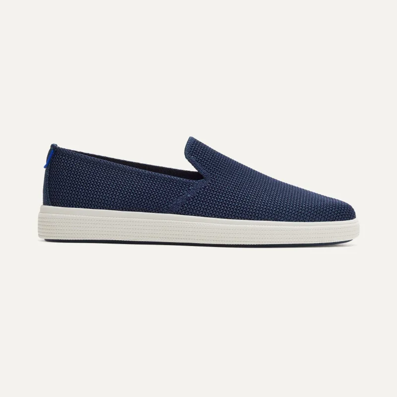 The Ravello Slip On Sneaker - Dark Navy sold by Rothy's