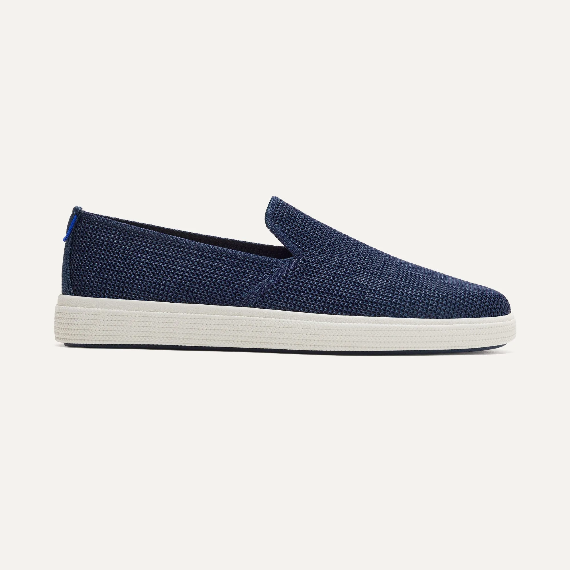 The Ravello Slip On Sneaker - Dark Navy sold by Rothy's
