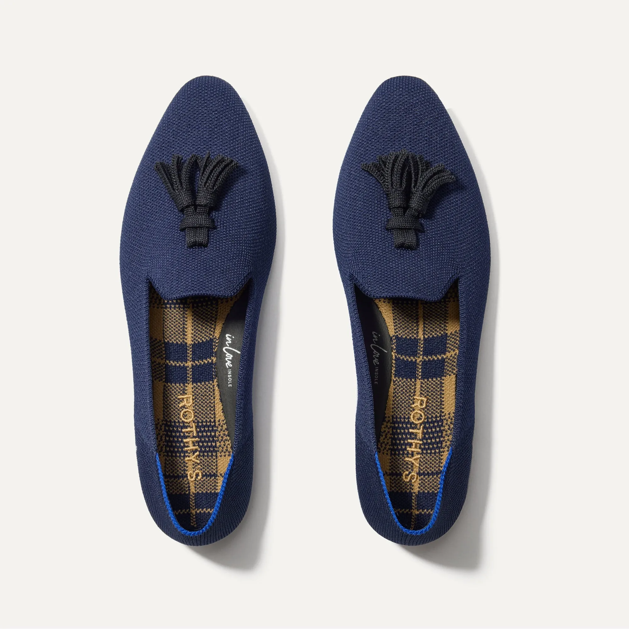 The Almond Tassel Loafer - Deep Navy sold by Rothy's
