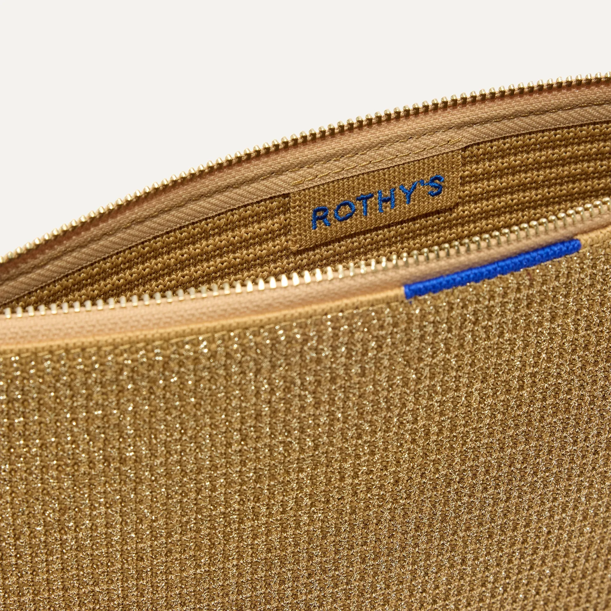 The Convertible Clutch - Glitzy Gold sold by Rothy's product image thumbnail 4