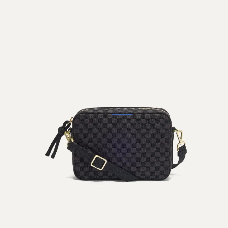 The Crossbody Camera Bag sold by Rothy's