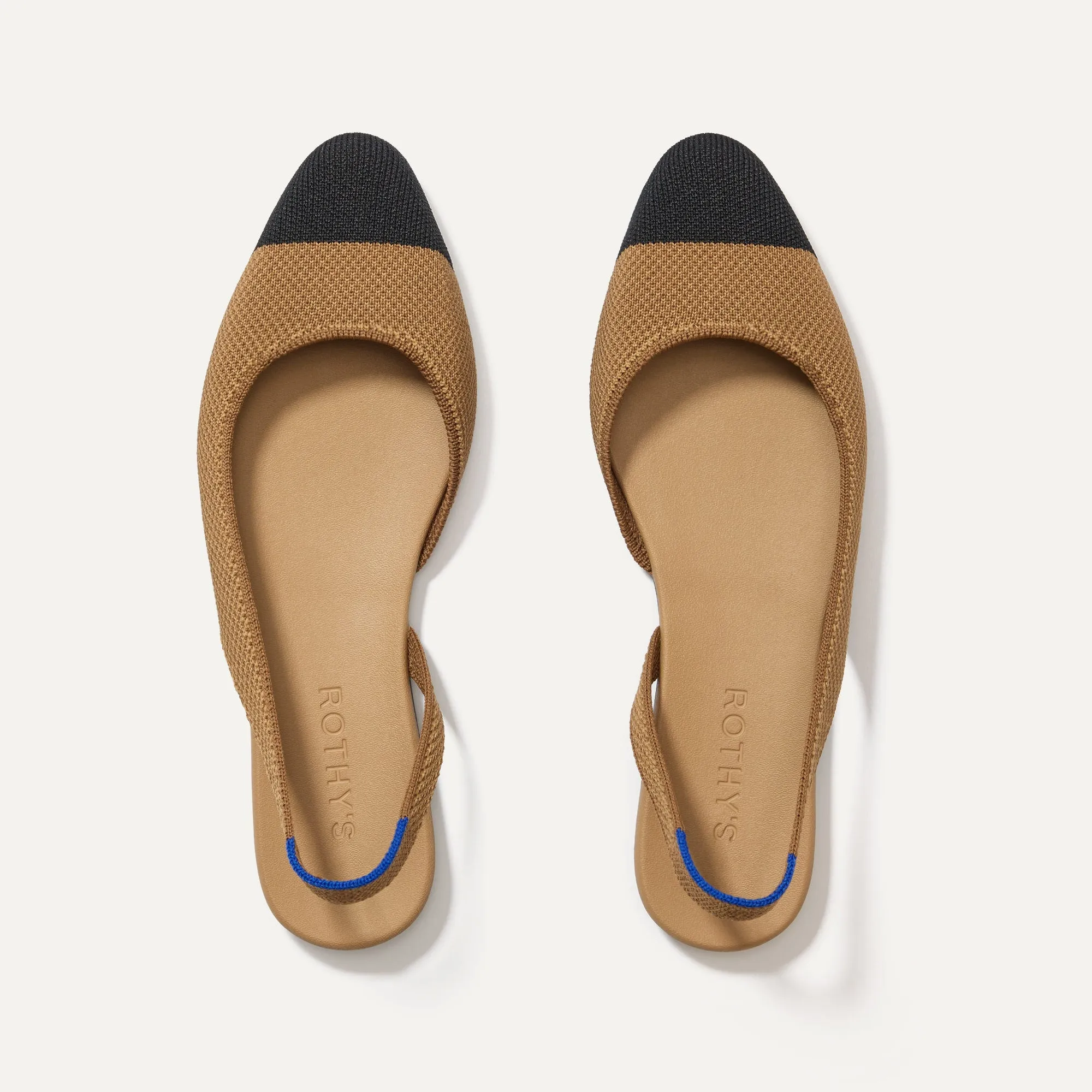 The Almond Slingback - Tawny Captoe sold by Rothy's