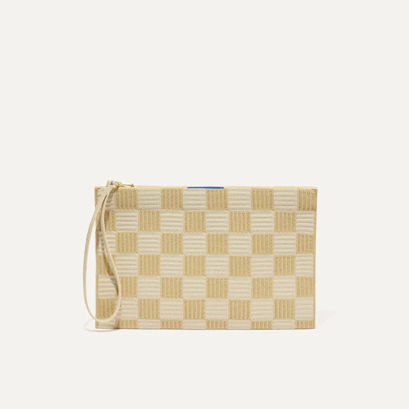 The Wristlet - Checker Sand sold by Rothy's