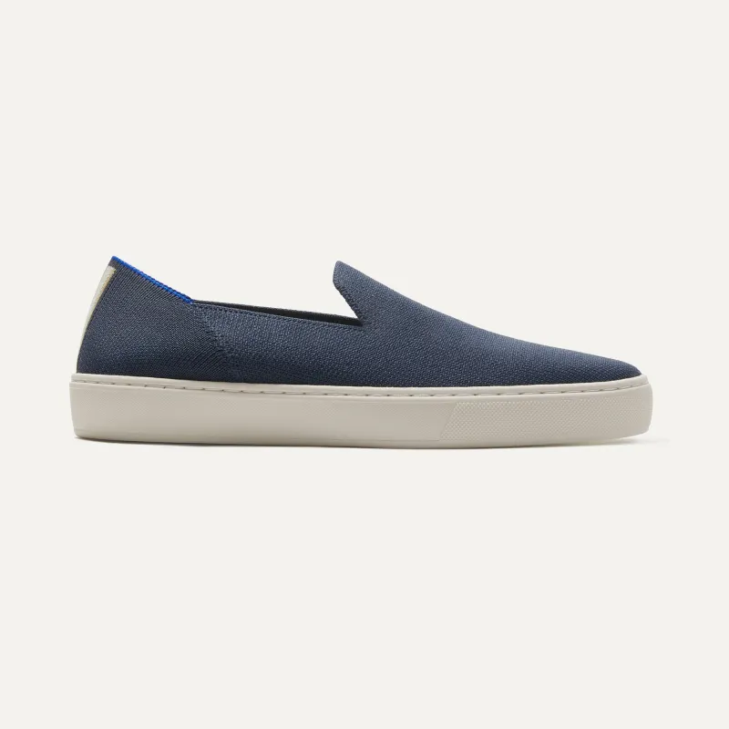 The Original Slip On Sneaker - Navy sold by Rothy's