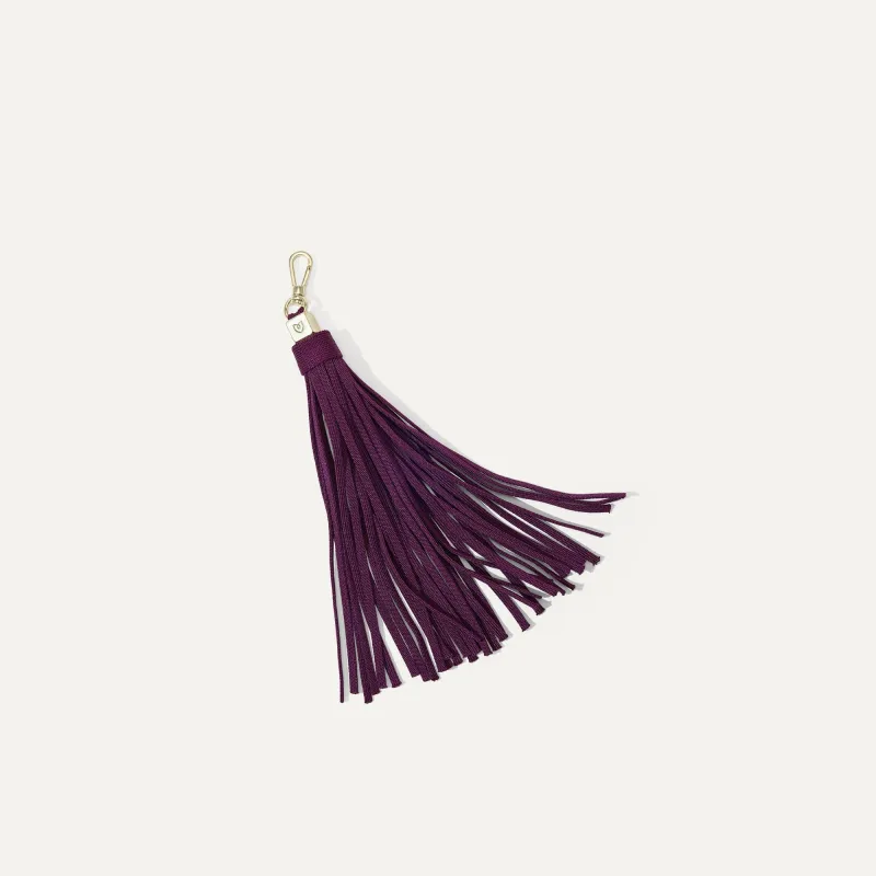 The Tassel Clip - Plum sold by Rothy's