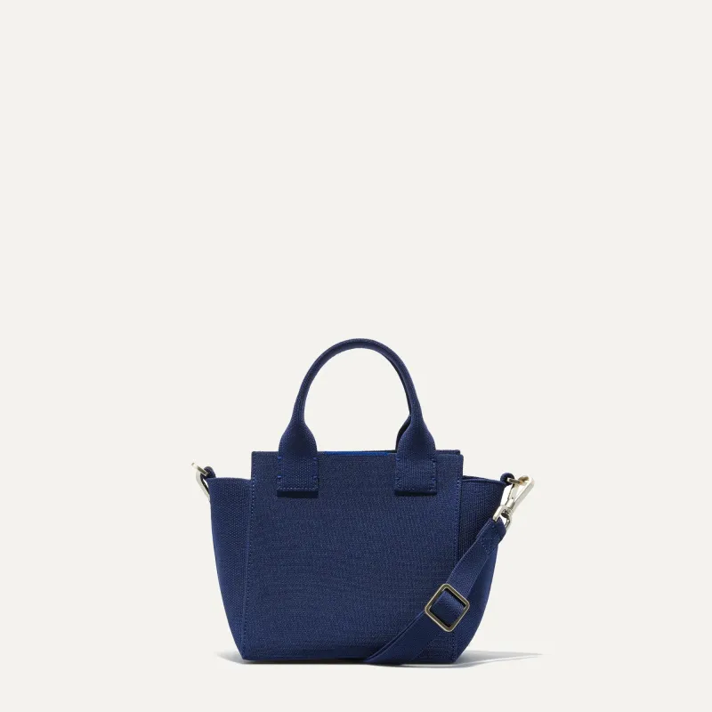 The Mini Handbag - Royal Blue sold by Rothy's