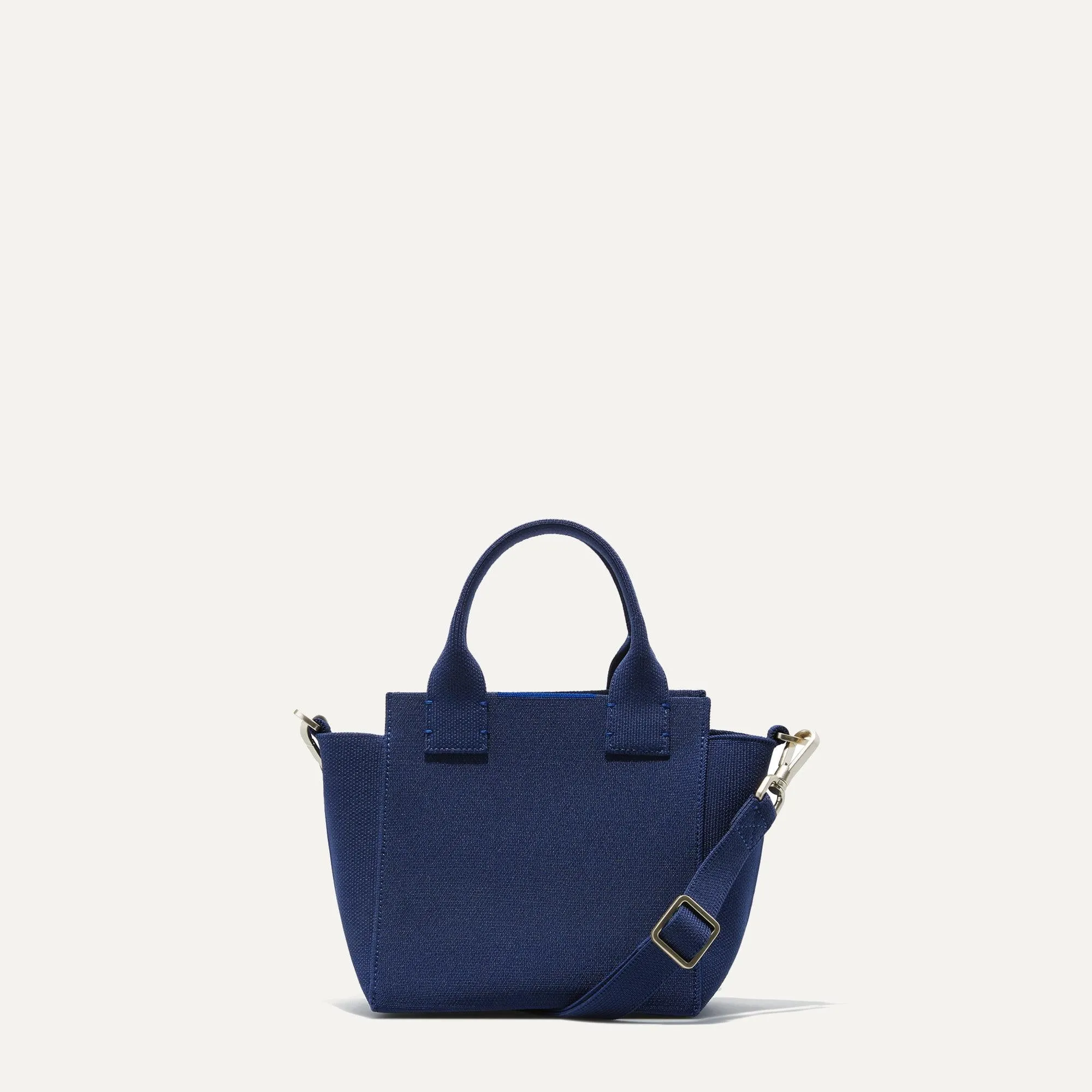 The Mini Handbag - Royal Blue sold by Rothy's