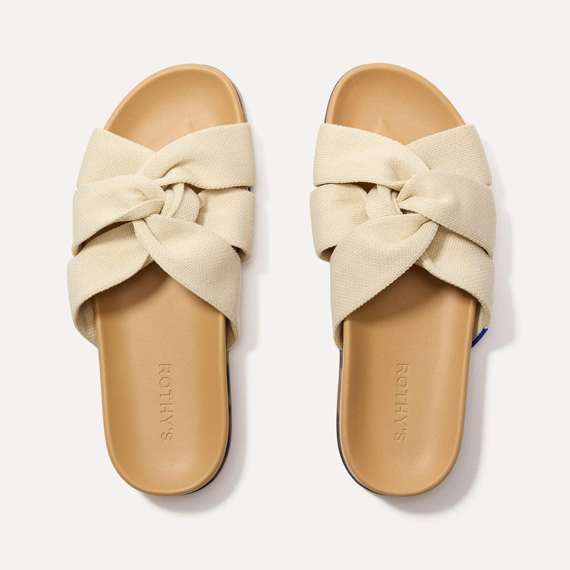 The Twist Slide - Coconut sold by Rothy's