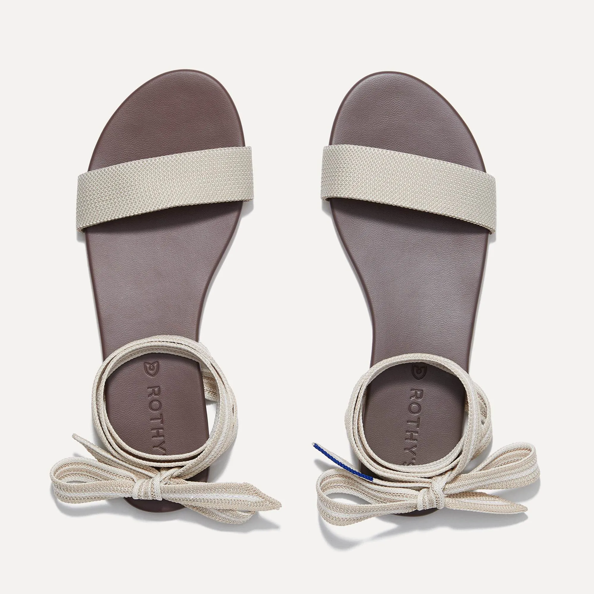 The Wrap Sandal - Sandcastle sold by Rothy's