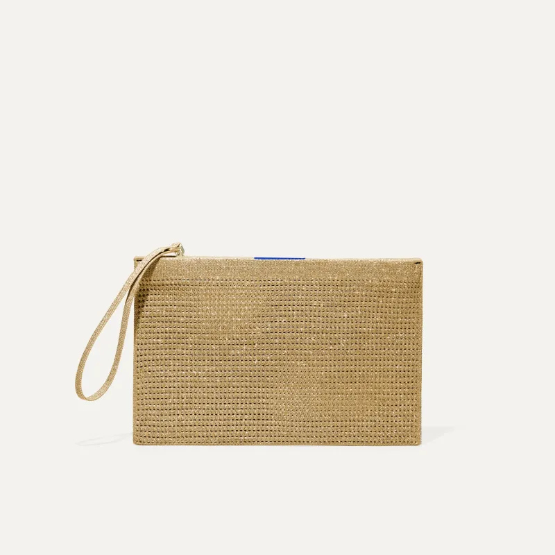 The Wristlet - Golden Perf sold by Rothy's