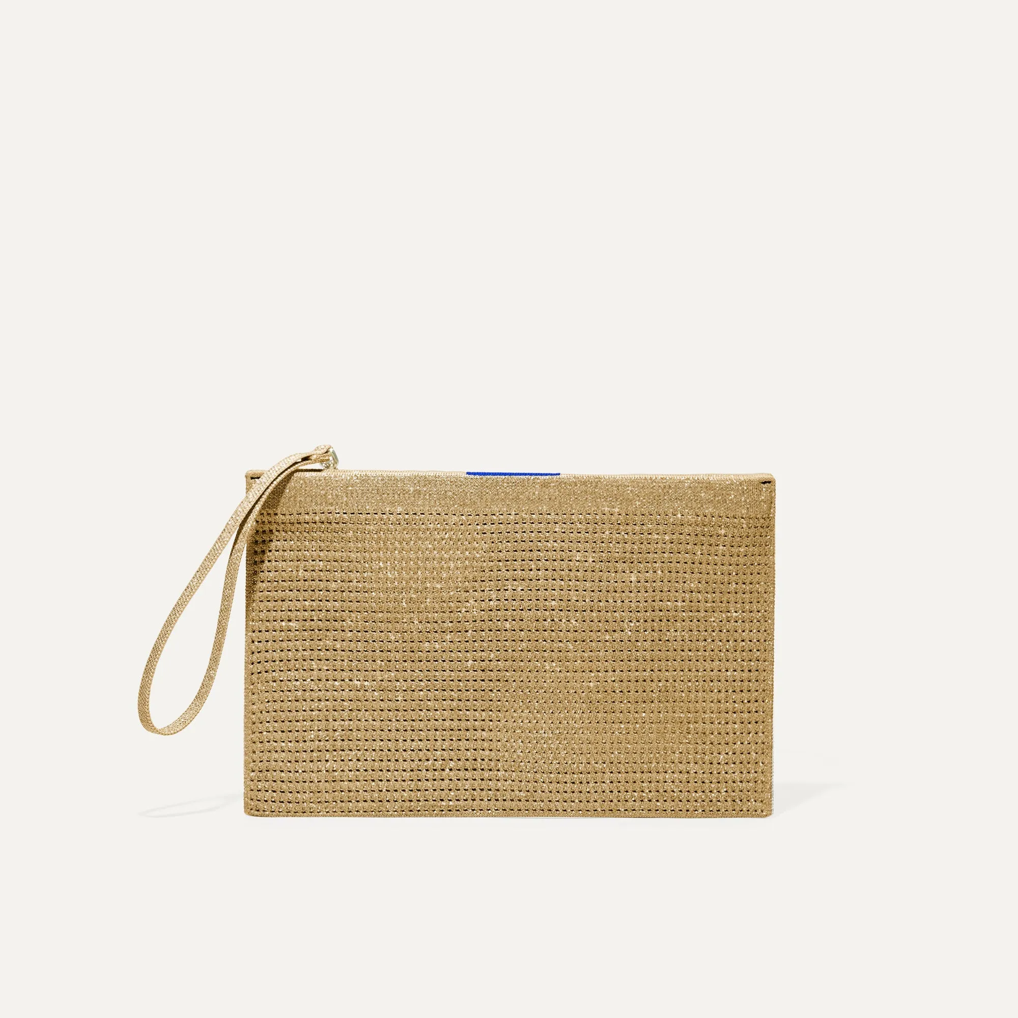 The Wristlet - Golden Perf sold by Rothy's