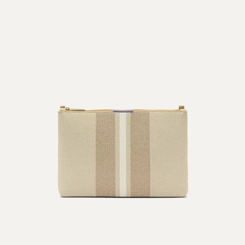 The Convertible Clutch - Oat Latte sold by Rothy's