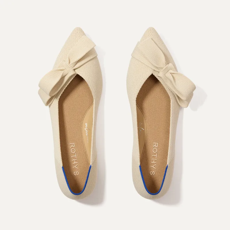 The Bow Point II - Conch sold by Rothy's