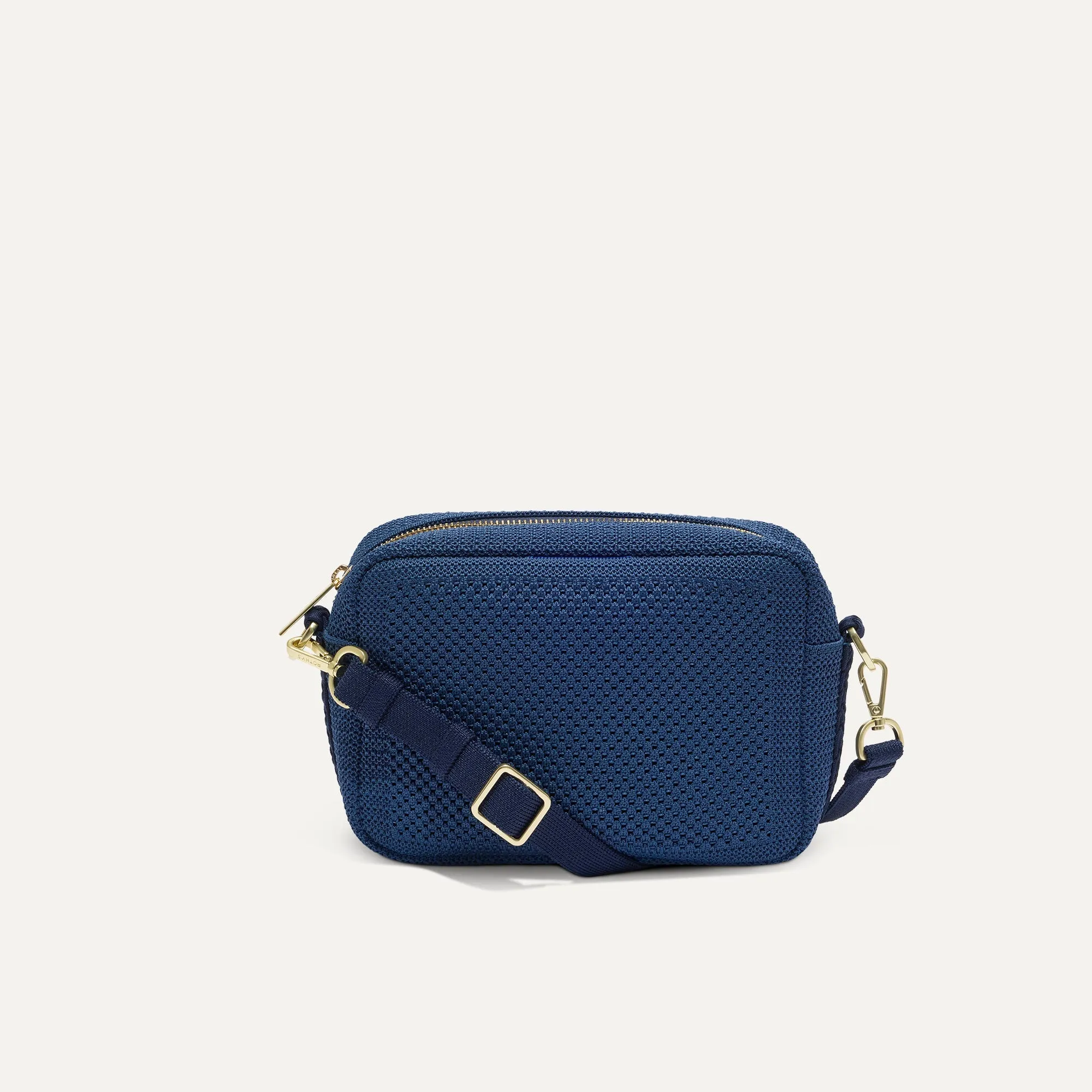 The Crossbody Camera Bag - Lagoon Open-Knit sold by Rothy's